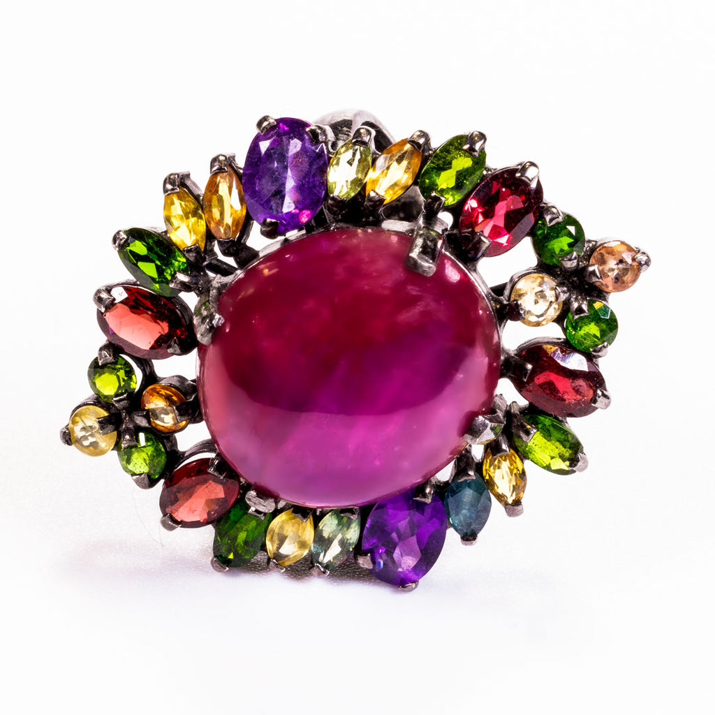 G. Ruby with Multi-stone Oval Cut Ring