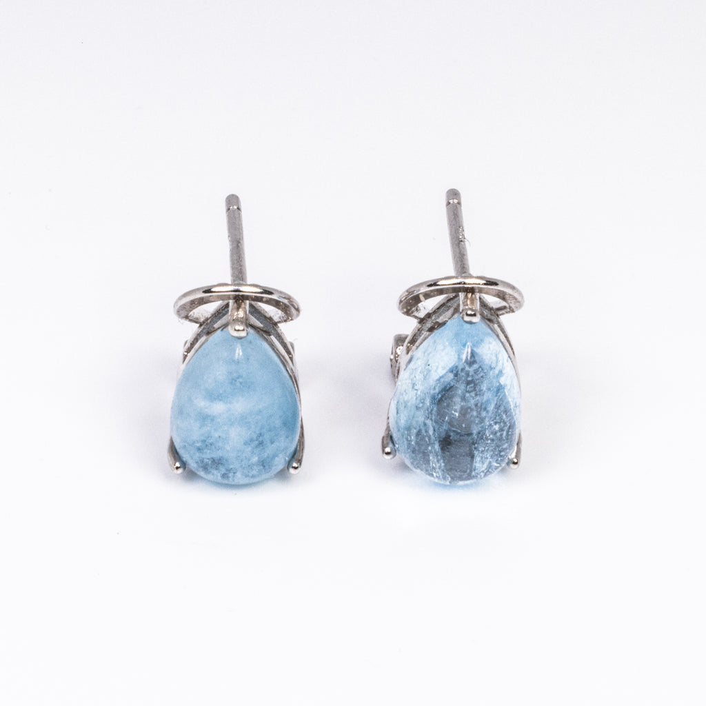 Aquamarine, is a symbol of committed love. Promoting faithfulness and friendship.
