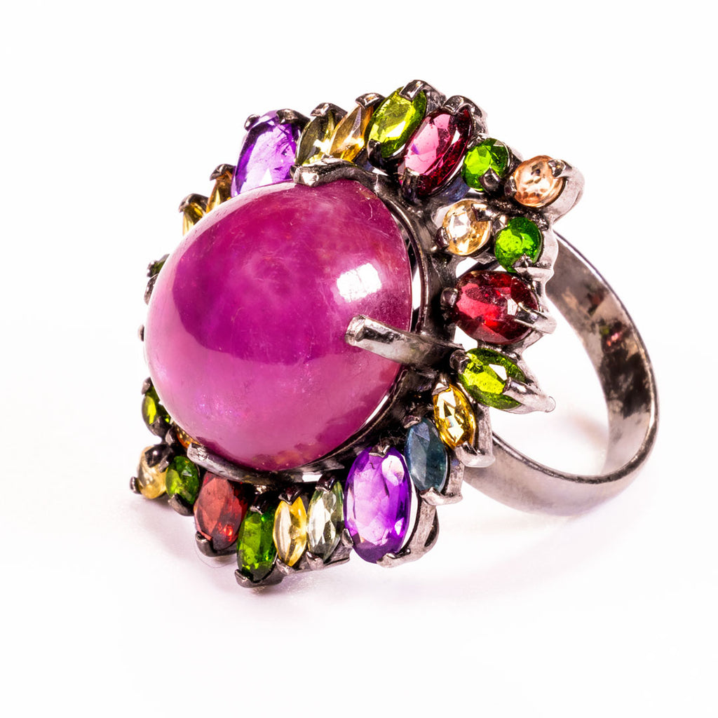 G. Ruby with Multi-stone Oval Cut Ring