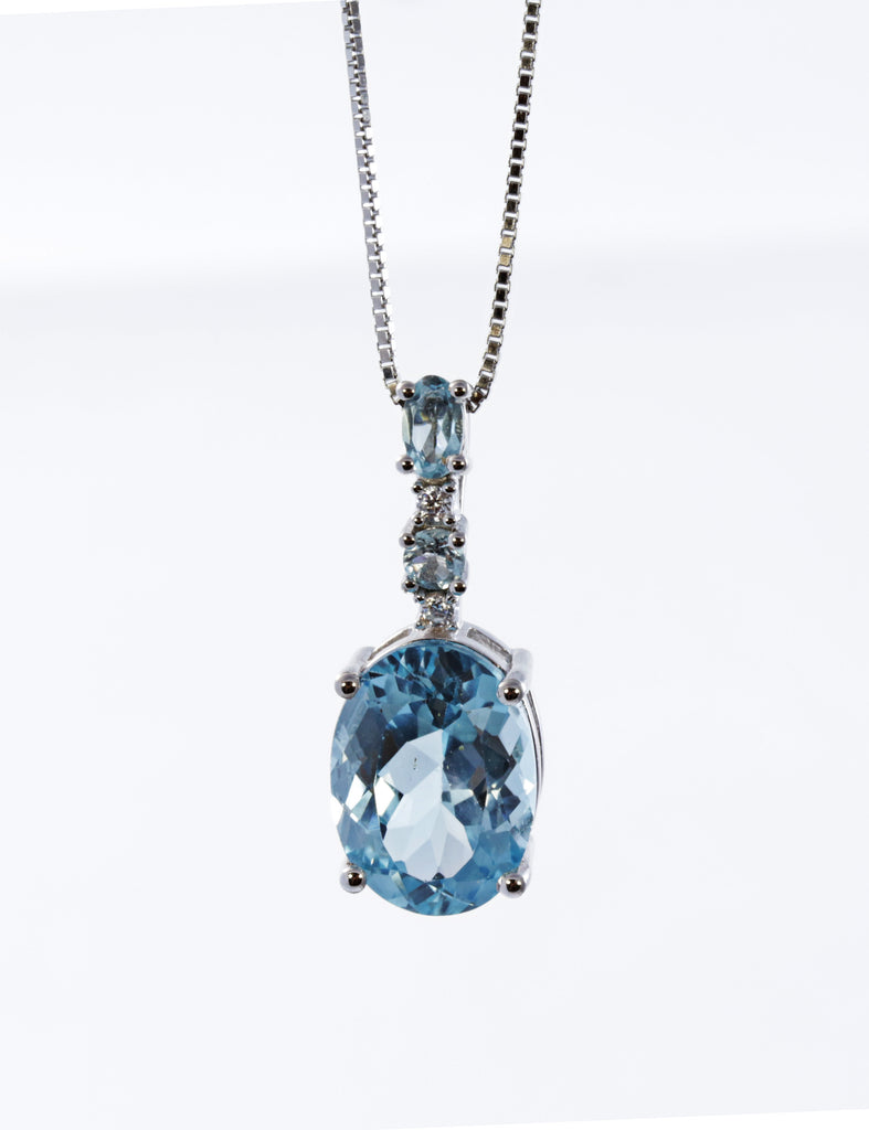 Oval Blue Zircon Pendant in Sterling Silver and Rhodium