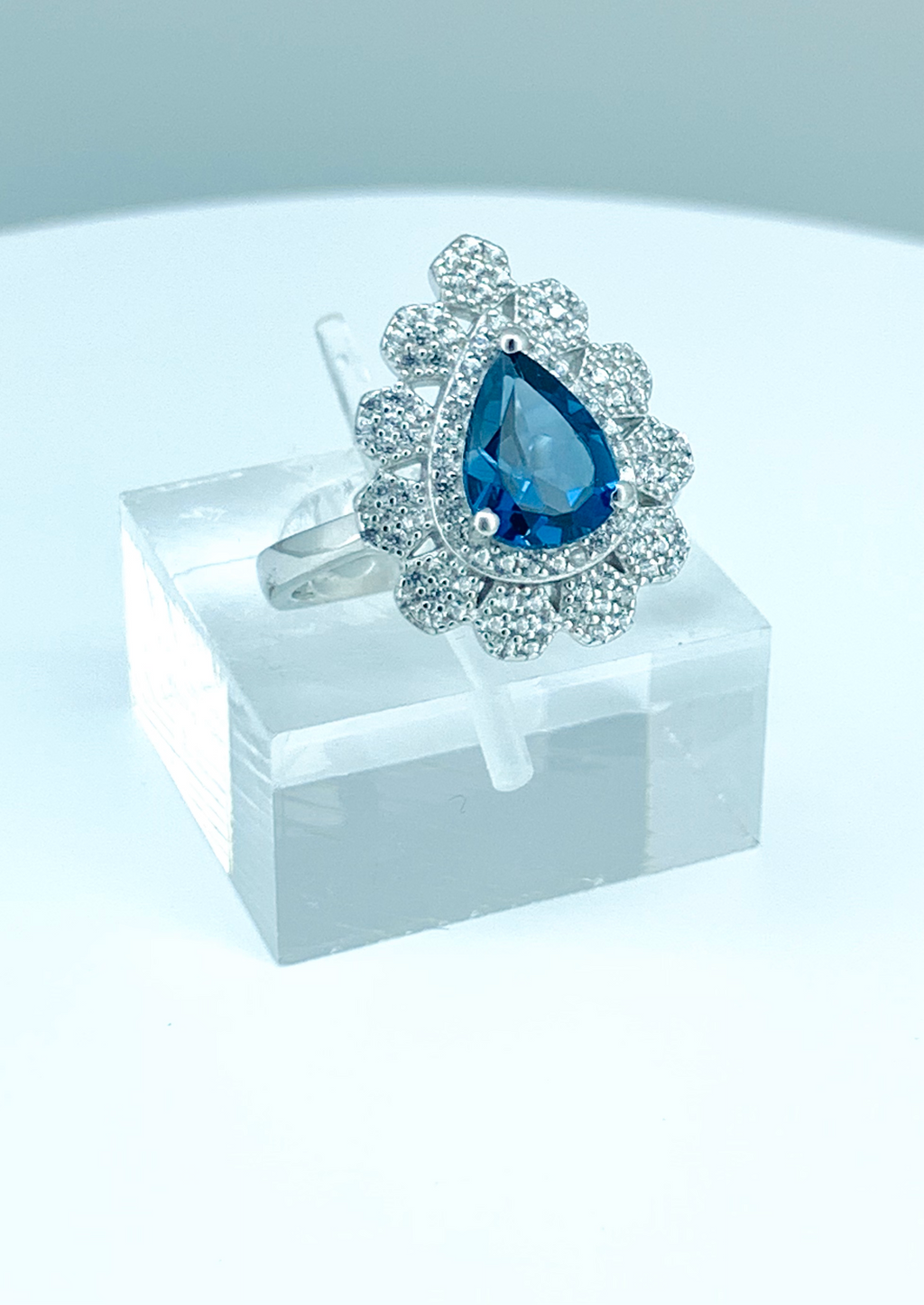 Pear shaped blue topaz 2025 engagement ring