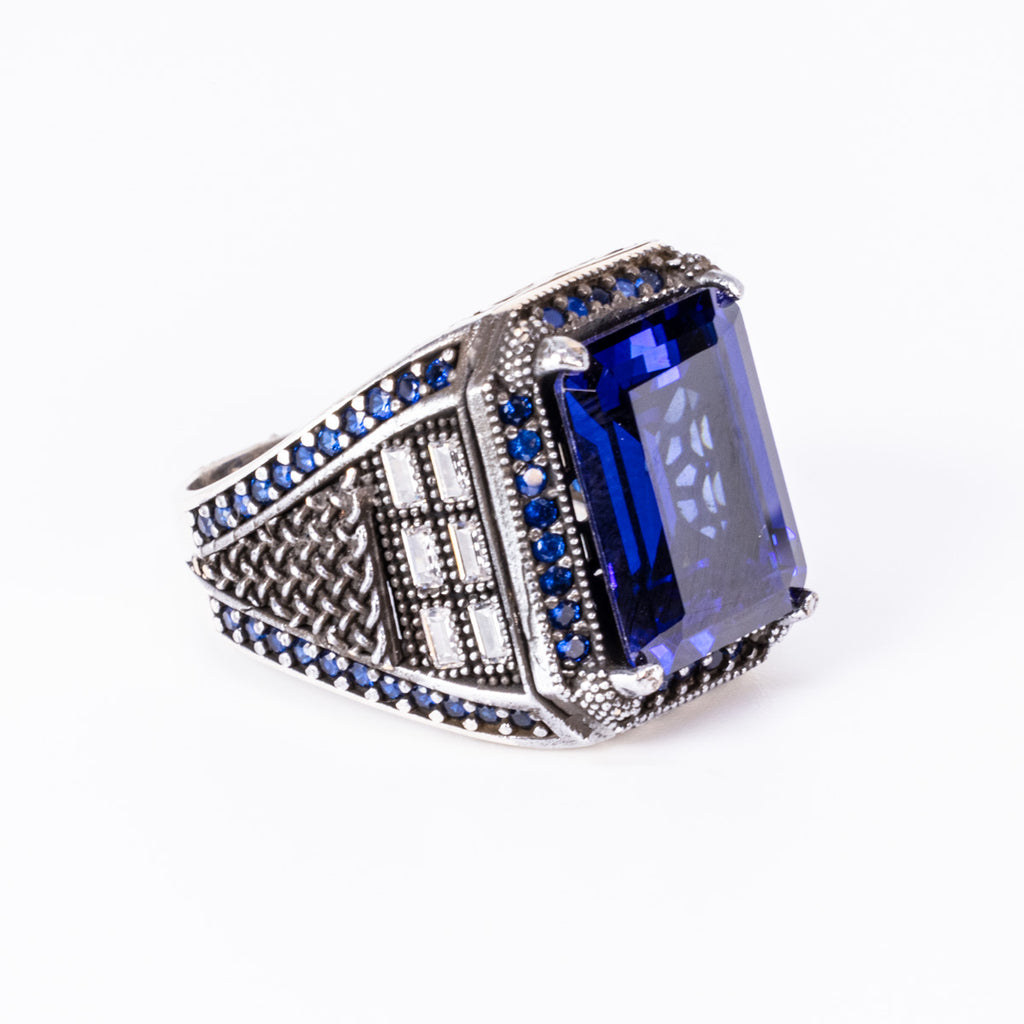 Emerald Cut Sapphire Ring with Cubic Zirconia Accents in Sterling Silver and Rhodium