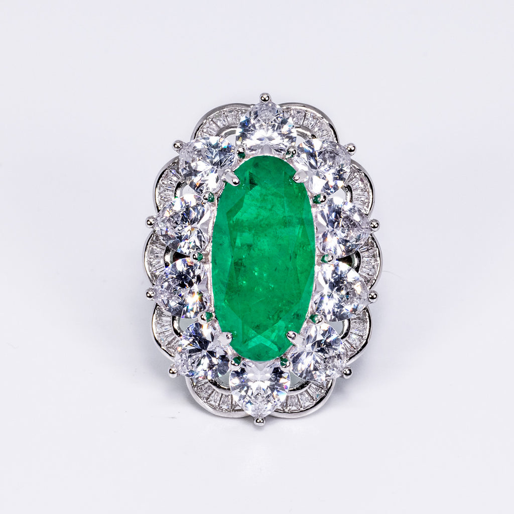 Handcrafted Emerald Stone with White CZ and pure Sterling Silver 925 ring. This handmade ring by Mulu Jewelry would be a special gift for anyone, but especially for May's baby.
