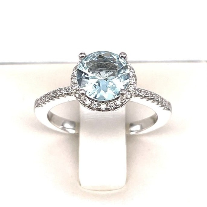 Aquamarine Halo Ring with Cubic Zirconia in Sterling Silver and Rhodium