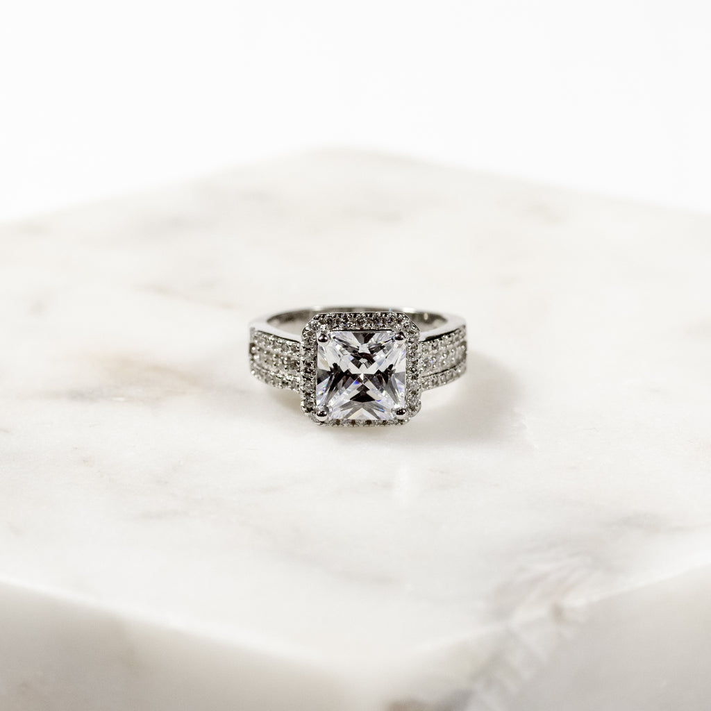 Framed White Zircon Ring with CZ Accents in Sterling Silver and Rhodium