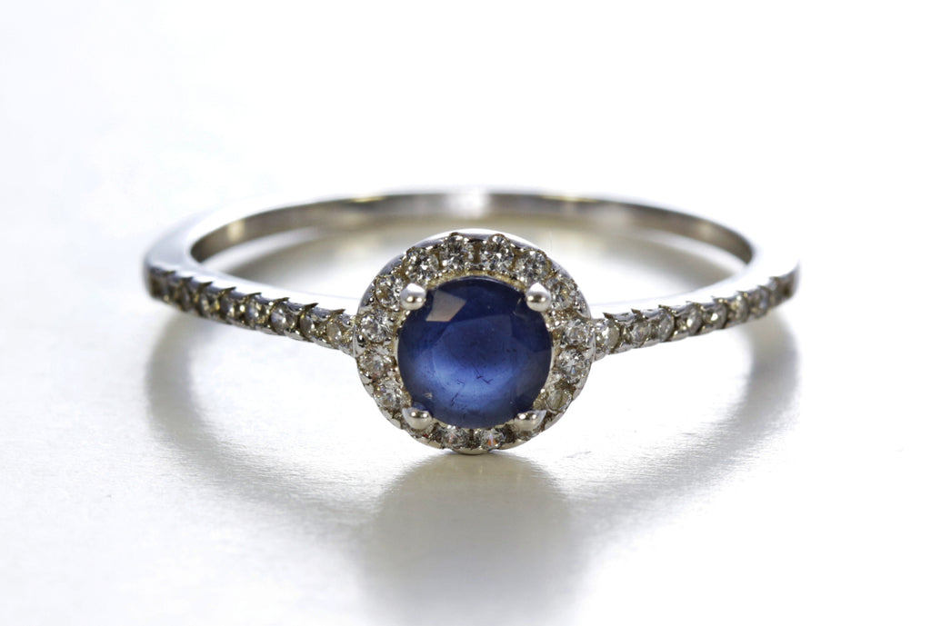 Blue Sapphire Halo Ring with Cubic Zirconia Accents in Sterling Silver and Rhodium