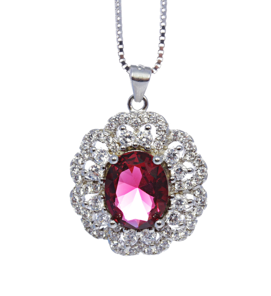Oval Garnet Pendant with CZ Accents in Sterling Silver and Rhodium