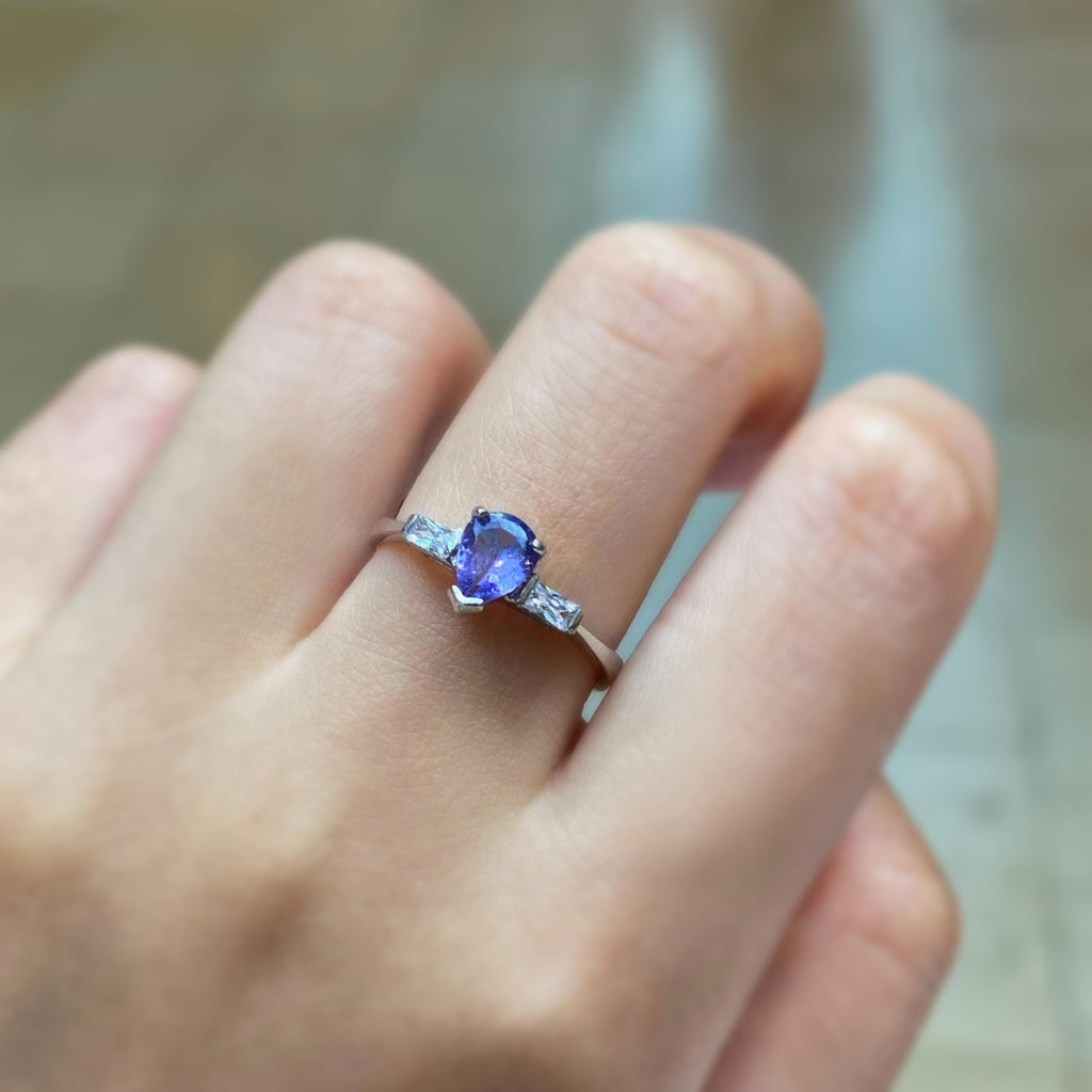 Pear Cut Tanzanite Ring with Cubic Zirconia Accents in Sterling Silver and Rhodium