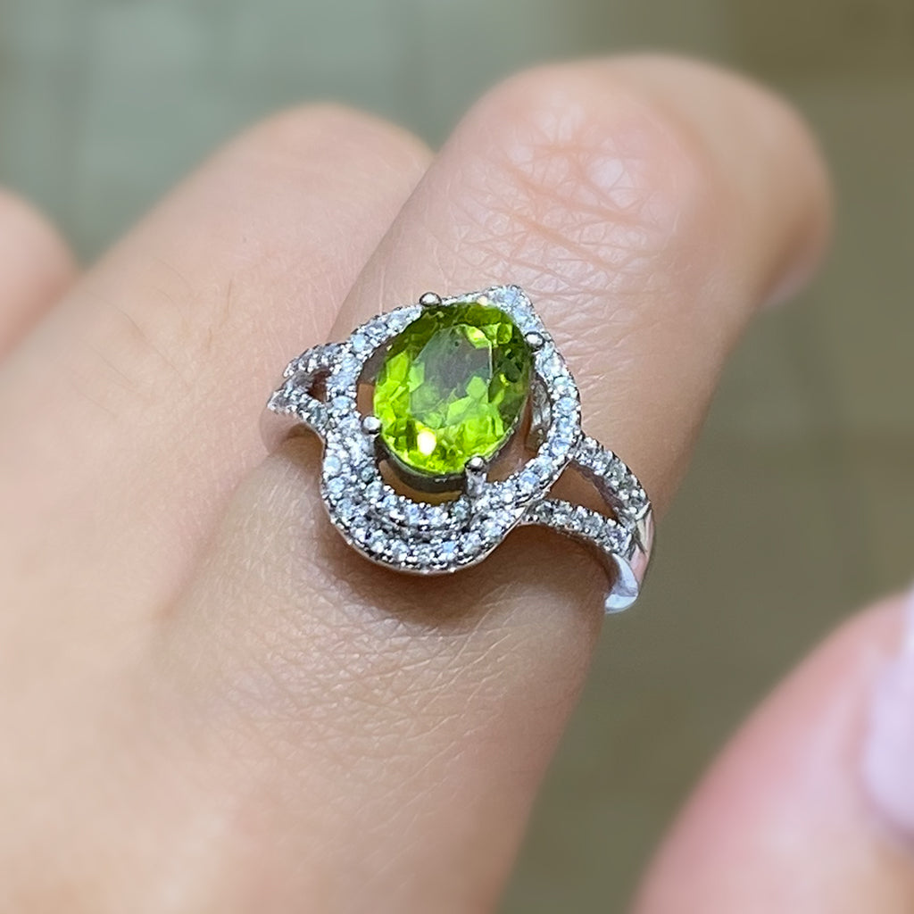 Oval Cut Peridot Ring with Cubic Zirconia in Sterling Silver and Rhodium